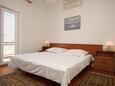 Camera da letto Baška Voda, Camera da letto nell'alloggi del tipo studio-apartment, condizionatore disponibile.