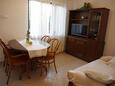 Podgora, Dining room in the apartment, air condition available and WiFi.