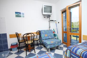 Sućuraj, Eetkamer in the studio-apartment, (pet friendly) en WiFi.