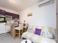 Vela Stiniva, Living room in the apartment, air condition available, (pet friendly) and WiFi.