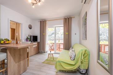 Vela Stiniva, Living room in the apartment, air condition available, (pet friendly) and WiFi.