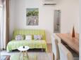 Vela Stiniva, Living room in the apartment, air condition available, (pet friendly) and WiFi.
