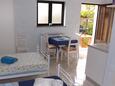 Umag, Dining room in the studio-apartment, air condition available and WiFi.