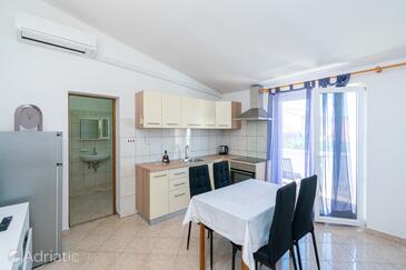Pašman, Jídelna v ubytování typu apartment, s klimatizací a WiFi.