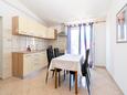 Pašman, Jídelna v ubytování typu apartment, s klimatizací a WiFi.