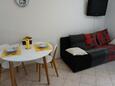 Dining room Pula, Dining room in the studio-apartment, air condition available and WiFi.
