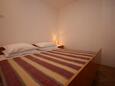 Pula, Bedroom in the apartment, air condition available and WiFi.