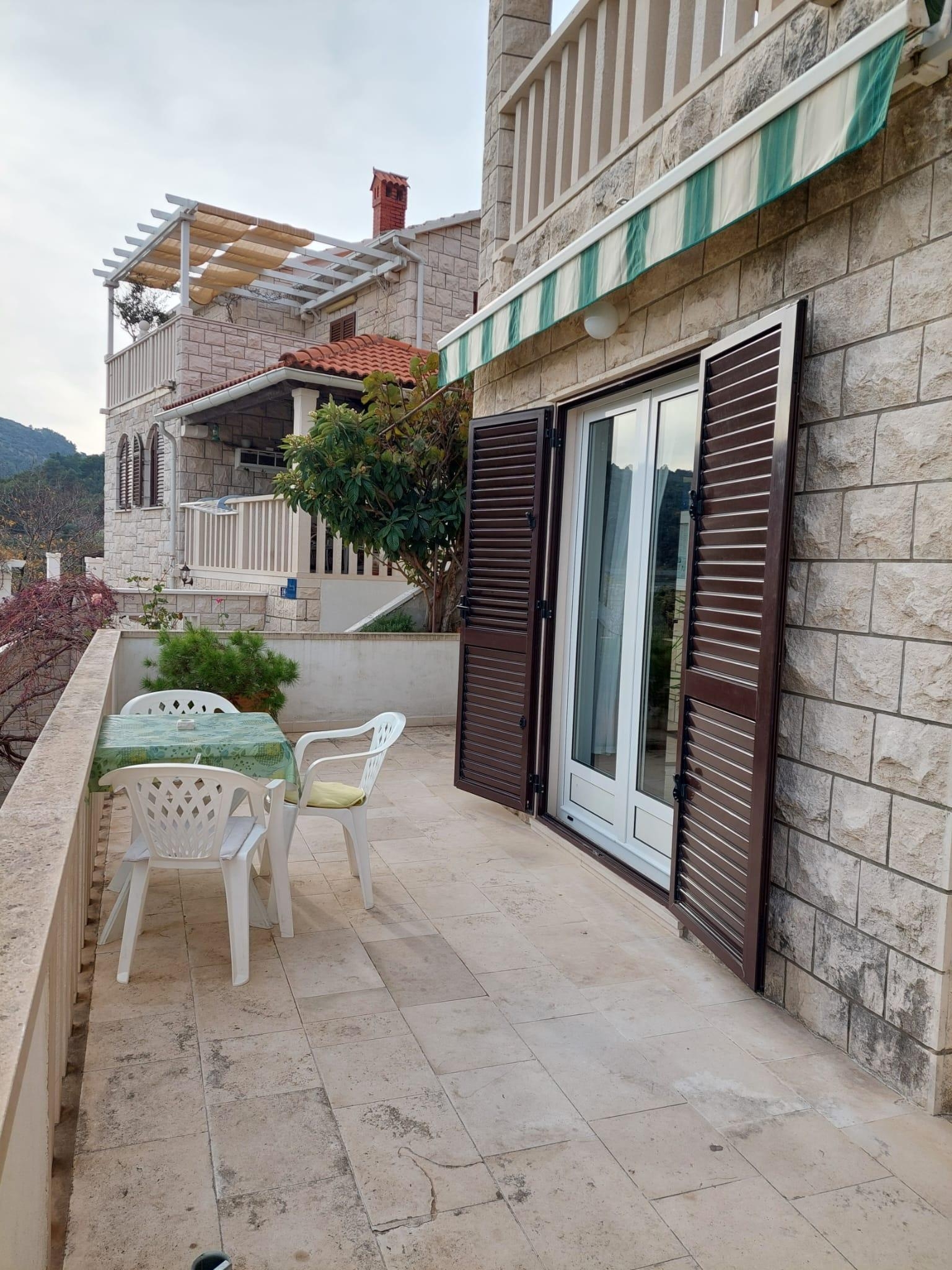 One bedroom apartment with terrace Postira, Brač  A-a