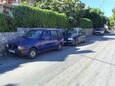 Parking lot Postira, Brač, Parking lot 702 - Apartments near sea with pebble beach.