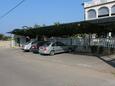 Parkiralište Novigrad, Novigrad, Parkiralište 7037 - Apartmani sa šljunčanom plažom.