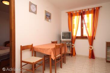 Fažana, Comedor in the apartment, air condition available y WiFi.