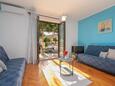 Living room Flengi, Living room in the apartment, air condition available, (pet friendly) and WiFi.