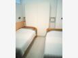 Ložnice 2 Fažana, Ložnice 2 v ubytování typu apartment, domácí mazlíčci povoleni a WiFi.