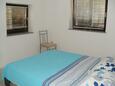 Bedroom Fažana, Bedroom in the apartment, air condition available and WiFi.
