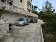 Parking lot Postira, Brač, Parking lot 727 - Apartments with pebble beach.