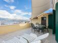 Postira, Terrasse dans l’hébergement en type apartment, avec la vue sur la mer et WiFi.