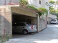 Parking lot Postira, Brač, Parking lot 741 - Apartments with pebble beach.