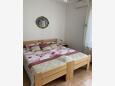 Rabac, Dormitorio in the apartment, air condition available y WiFi.