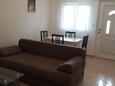 Pula, Living room in the apartment, air condition available and WiFi.