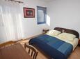 Ložnice Dugi Rat, Ložnice v ubytování typu studio-apartment, s klimatizací a WiFi.
