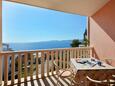 Pisak, Terrasse dans l’hébergement en type apartment, avec la vue sur la mer et WiFi.