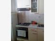 Kitchen Povlja, Kitchen in the apartment, air condition available.