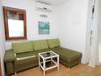 Obývací pokoj Mošćenice, Obývací pokoj v ubytování typu apartment, s klimatizací, domácí mazlíčci povoleni a WiFi.