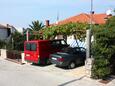 Parking lot Maslinica, Šolta, Parking lot 775 - Apartments near sea with rocky beach.