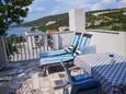 Terrace Maslinica, Terrace in the apartment, with a sea view and WiFi.