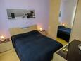 Ložnice Lovran, Ložnice v ubytování typu apartment, s klimatizací a WiFi.