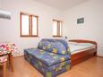 Kraj, Dormitorio in the studio-apartment, air condition available y WiFi.