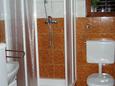 Bathroom Milna, Bathroom in the room.