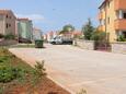 Parking lot Cres, Cres, Parking lot 7875 - Apartments near sea with pebble beach.