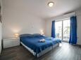 Ložnice Ika, Ložnice v ubytování typu studio-apartment, s klimatizací, domácí mazlíčci povoleni a WiFi.
