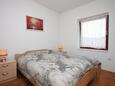 Mali Lošinj, Dormitorio in the apartment, air condition available y WiFi.