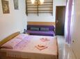 Ložnice Cres, Ložnice v ubytování typu studio-apartment, s klimatizací a WiFi.