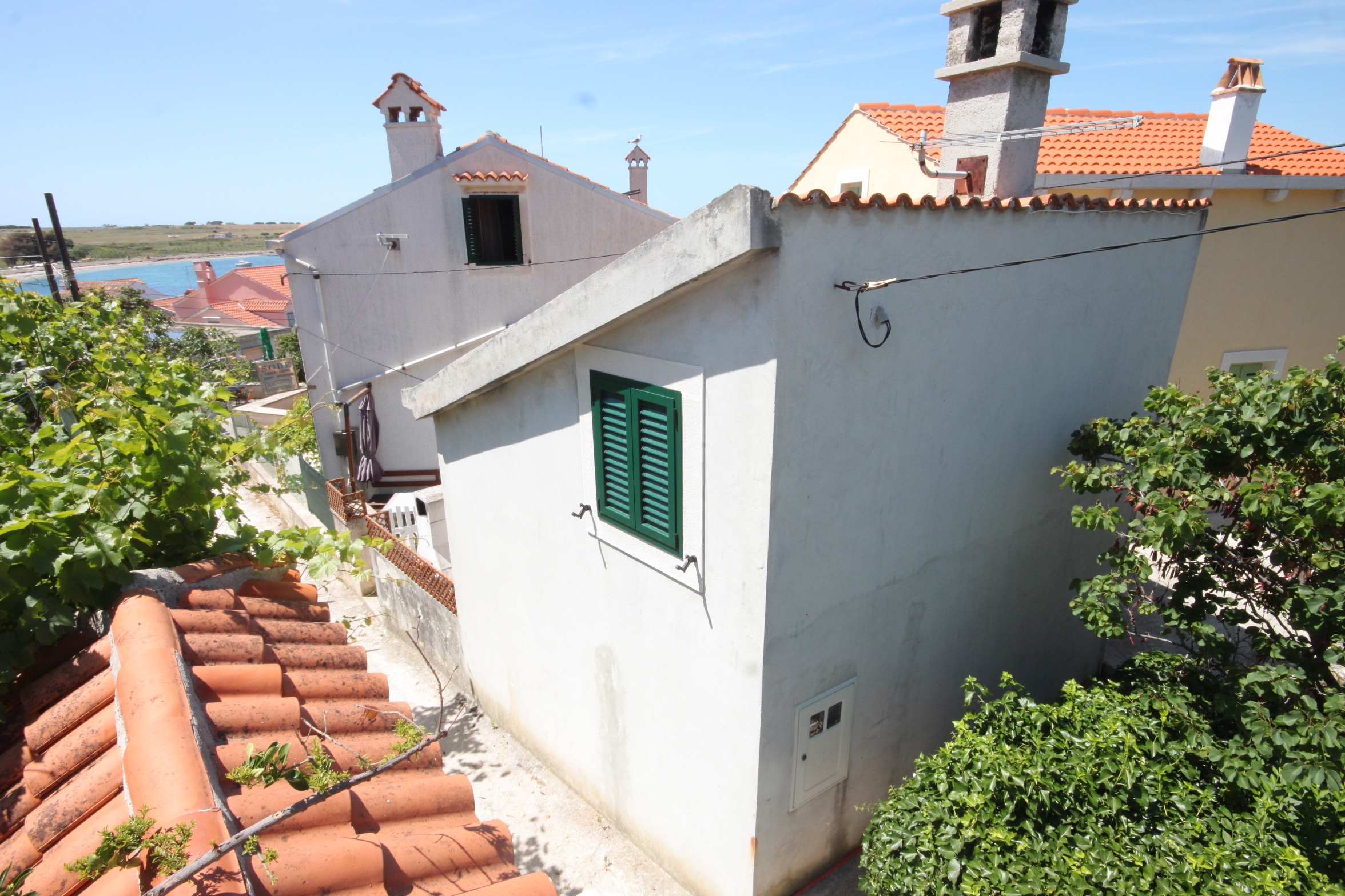 One bedroom house with terrace and sea view Unešić - Unije, Lošinj  K