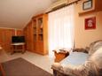 Obývací pokoj Susak, Obývací pokoj v ubytování typu studio-apartment, s klimatizací a WiFi.