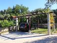 Parkiralište Miholašćica, Cres, Parkiralište 8070 - Apartmani sa šljunčanom plažom.