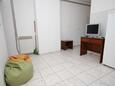 Obývacia izba Mali Lošinj, Obývacia izba v ubytovacej jednotke apartment, domáci miláčikovia povolení a WiFi.