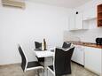 Tisno, Dining room in the apartment, air condition available, (pet friendly) and WiFi.