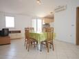 Dining room Žman, Dining room in the apartment, air condition available and (pet friendly).