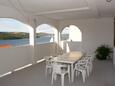Terrace Tisno, Terrace in the apartment, with a sea view, (pet friendly) and WiFi.