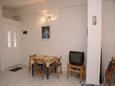 Tisno, Dining room in the apartment, (pet friendly) and WiFi.