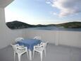 Terrace Tisno, Terrace in the apartment, with a sea view, (pet friendly) and WiFi.