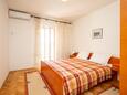 Bedroom 1 Pašman, Bedroom 1 in the apartment, air condition available, (pet friendly) and WiFi.