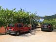 Parking lot Ugljan, Ugljan, Parking lot 8257 - Apartments near sea with pebble beach.
