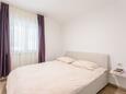 Bedroom Duće, Bedroom in the apartment, air condition available and WiFi.