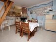 Vitane, Dining room in the house, (pet friendly).