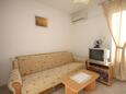 Living room Seget Vranjica, Living room in the apartment, air condition available and WiFi.